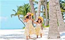 Children walking on the beach